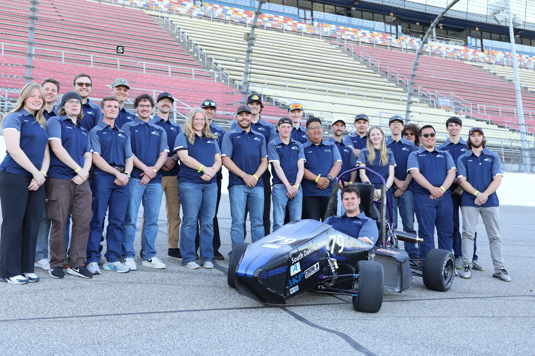 Formula Hardrocker Racing's 2026 student team standing with car 79 at competition.