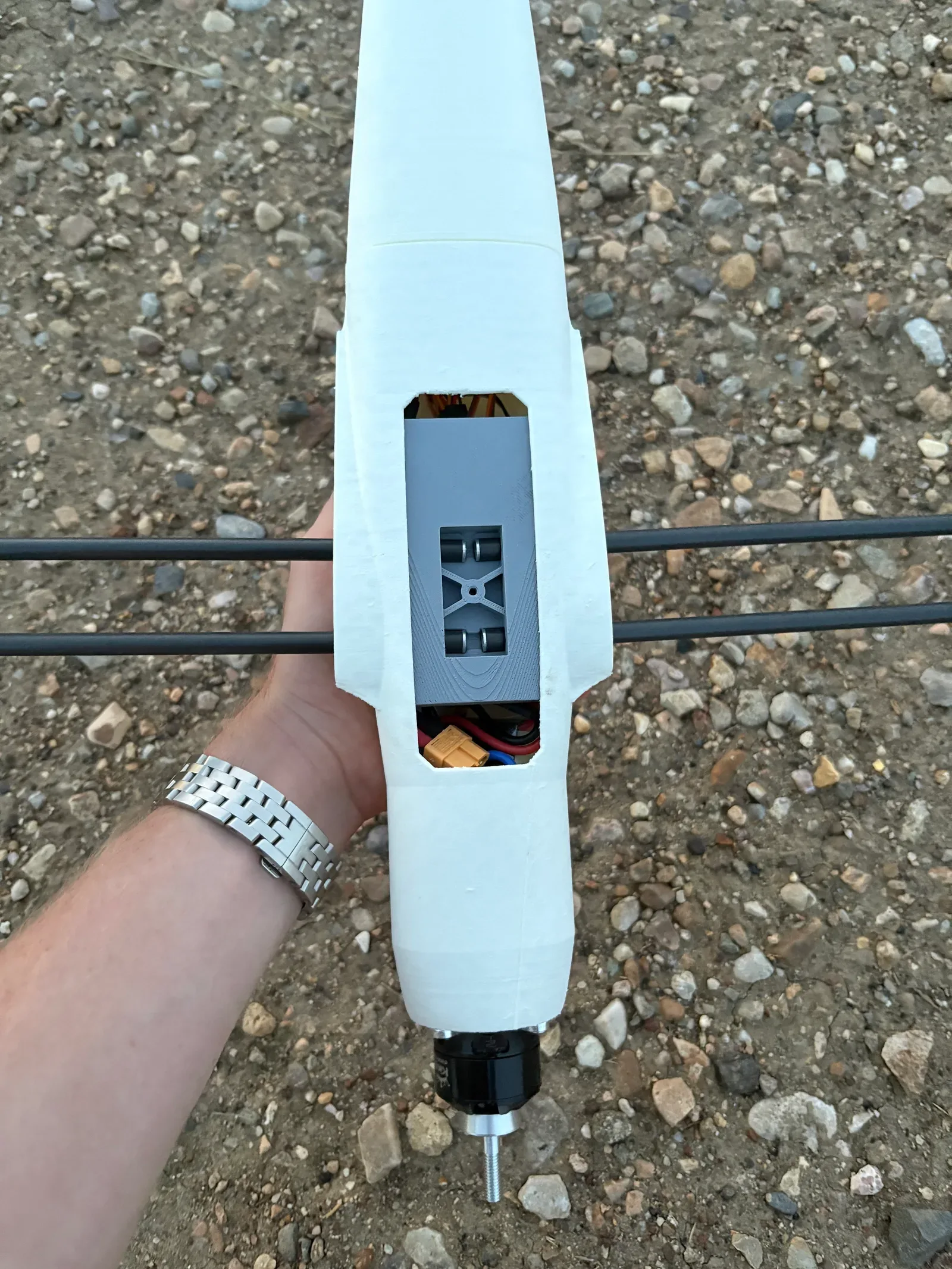 Carbon-fiber rods installed through a printed RC airplane wing