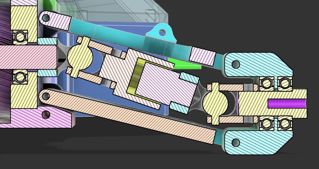 Section view of steel universal joints and a polycarbonate slip-spline shaft